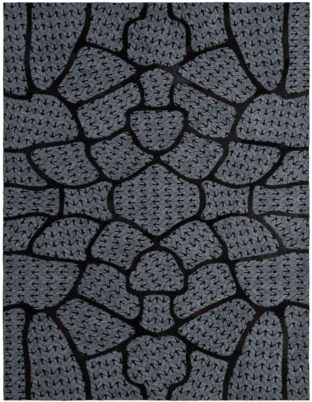 A 5x8 rectangular gray cowhide rug with an abstract patchwork pattern, ideal for a modern living room.