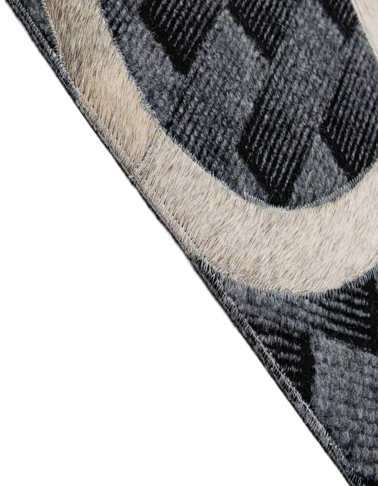 Detail image of  4' 11 x 8' Cowhide - Patchwork Rug