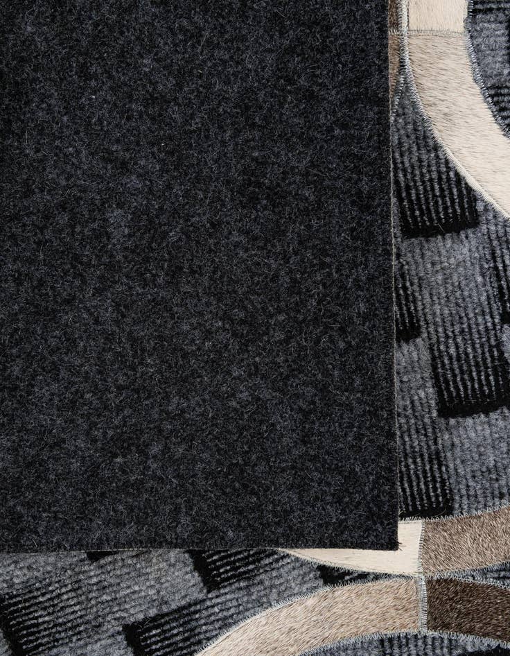 Detail image of  4' 11 x 8' Cowhide - Patchwork Rug