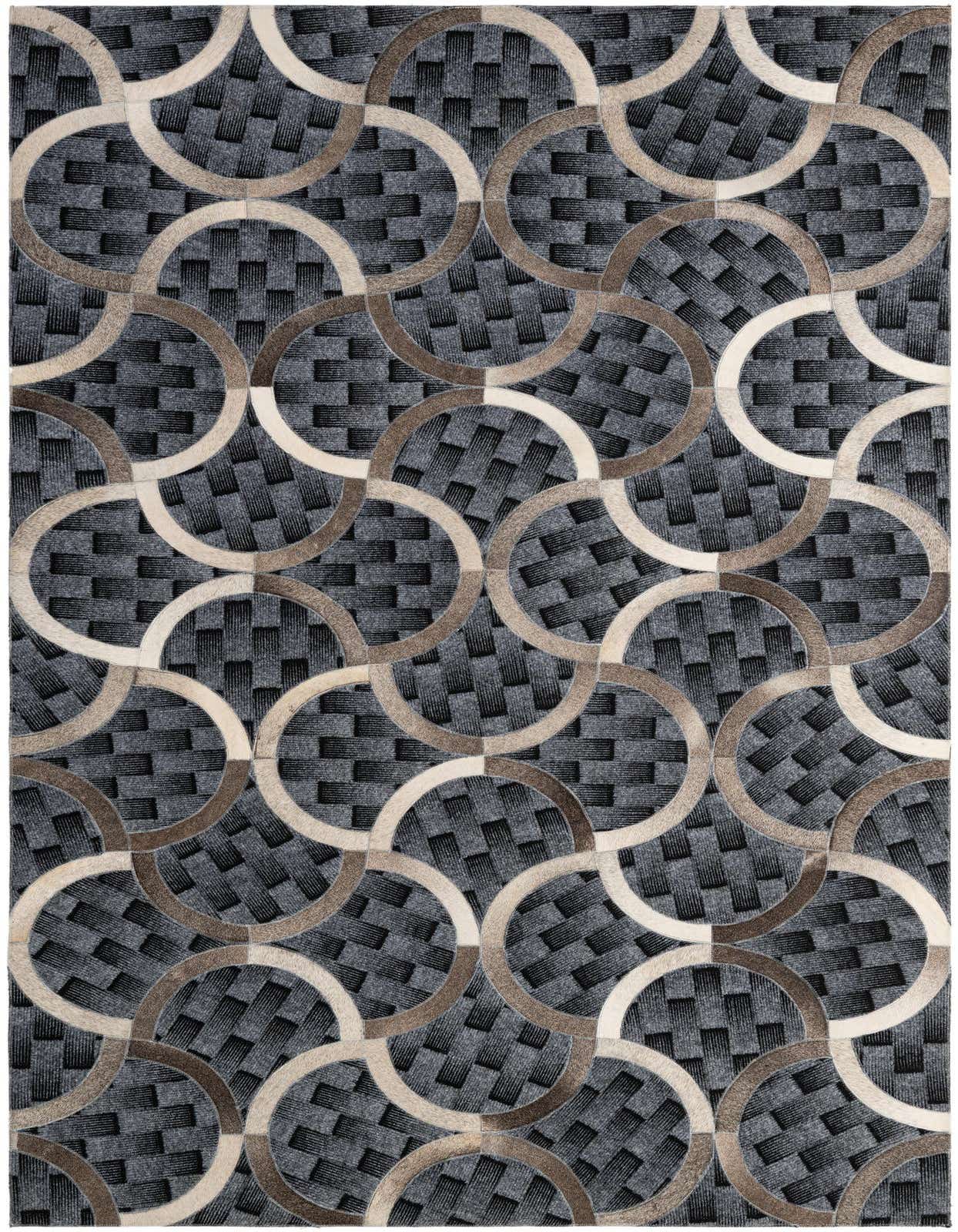 A 5x8 rectangular Cowhide - Patchwork rug featuring a modern abstract pattern of interlocking gray, silver, and beige circles over a textured dark gray background.