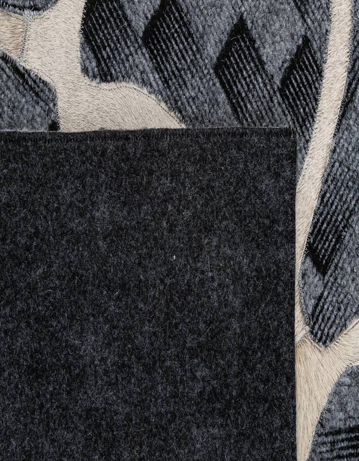 Detail image of  5' 2 x 8' Cowhide - Patchwork Rug