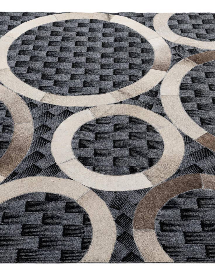 Detail image of  5' 1 x 7' 11 Cowhide - Patchwork Rug