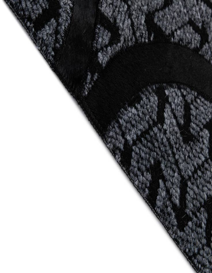 Detail image of  5' x 7' 11 Cowhide - Patchwork Rug