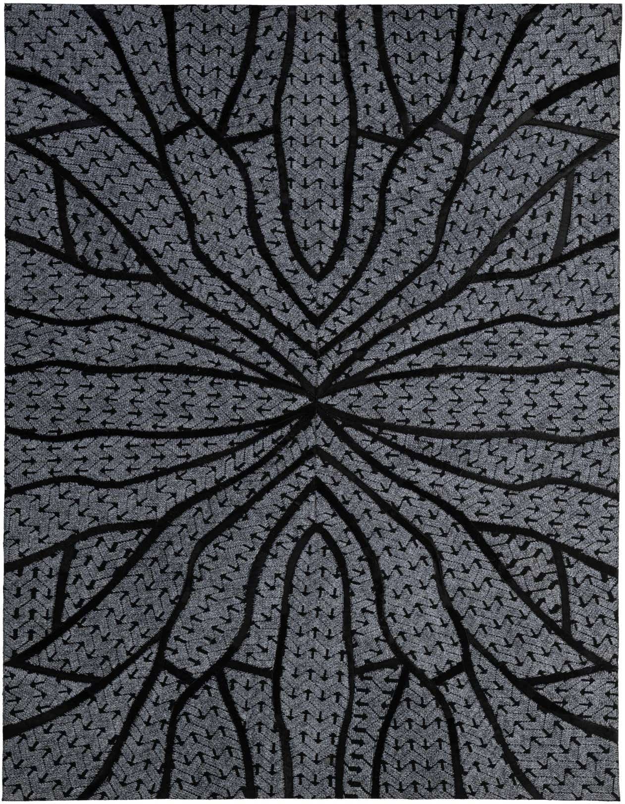 A 5x8 rectangular gray and black modern abstract cowhide rug, featuring a striking symmetrical pattern of dark, sweeping lines over a textured gray background with small arrow-like motifs.