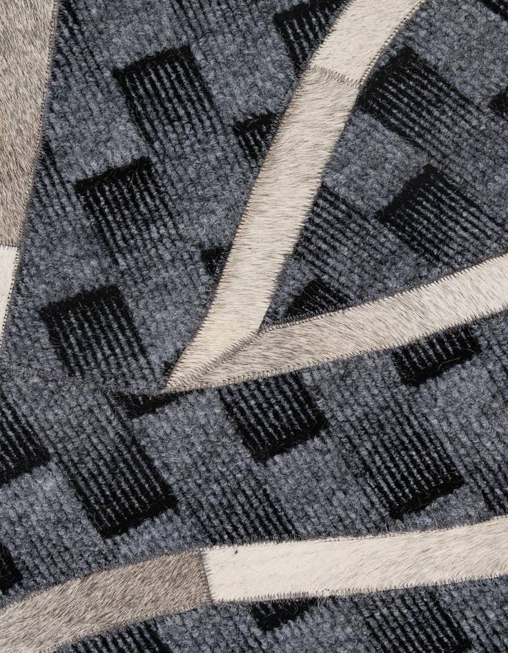 Detail image of  4' 11 x 8' Cowhide - Patchwork Rug