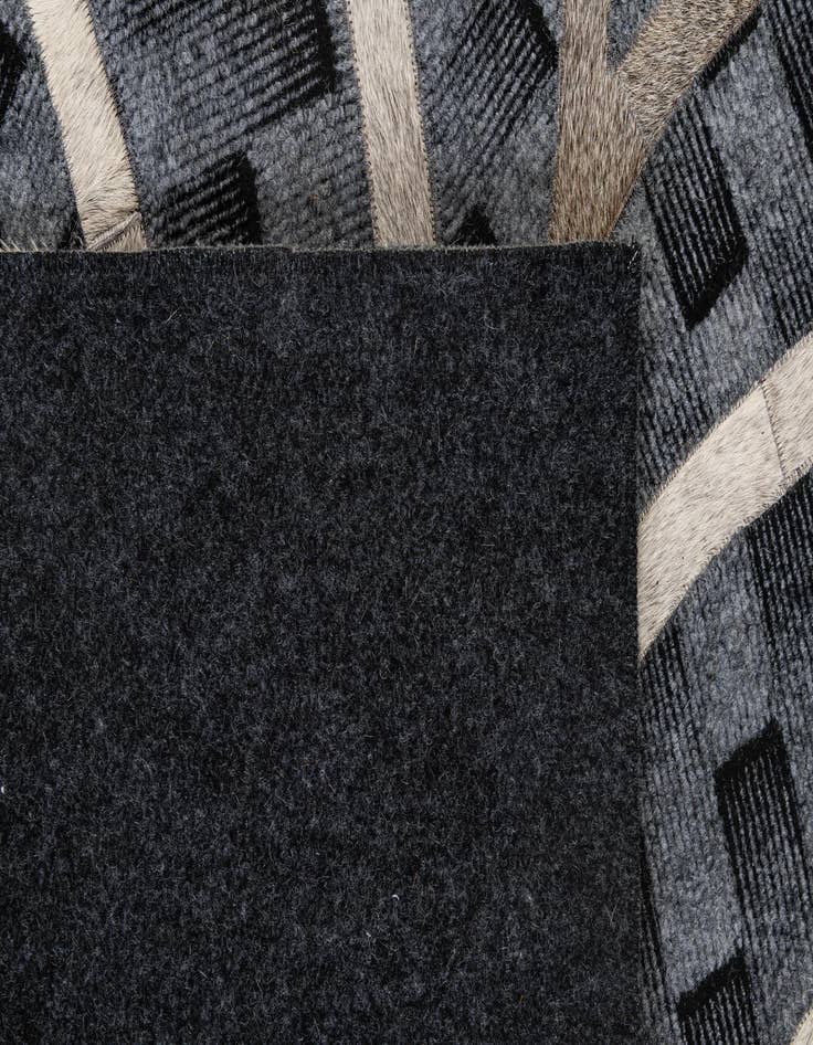 Detail image of  4' 11 x 8' Cowhide - Patchwork Rug