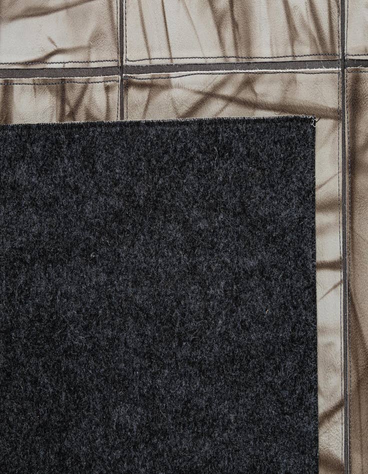 Detail image of  5' x 7' 11 Cowhide - Patchwork Rug