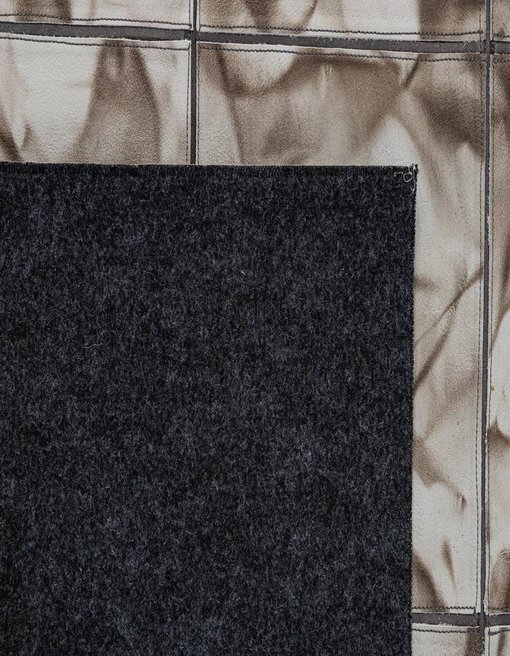 Detail image of  4' 11 x 7' 10 Cowhide - Patchwork Rug
