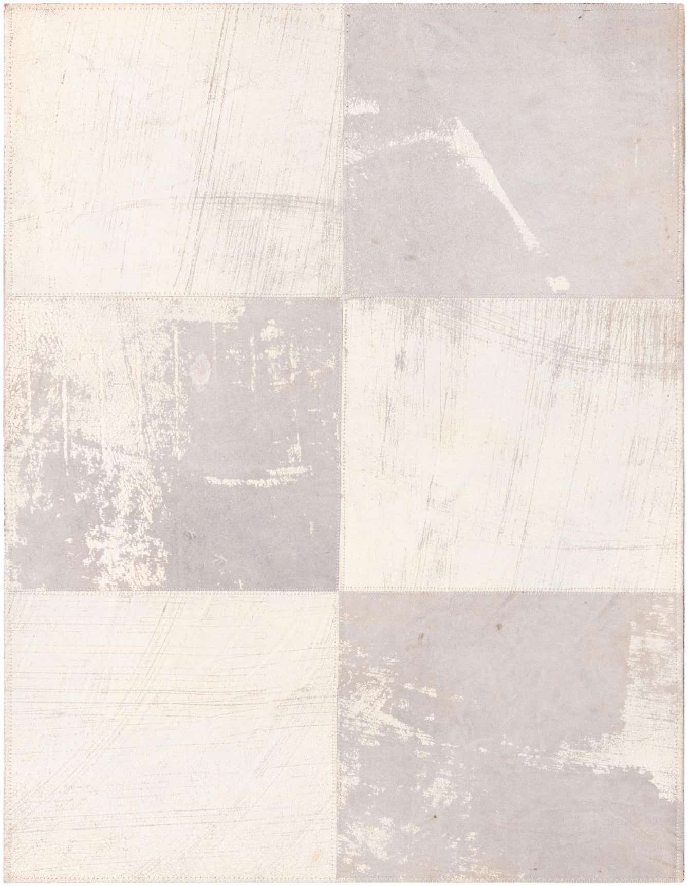 A 2x3 rectangular Cowhide Leather rug featuring a modern patchwork design in varying shades of gray and silver.