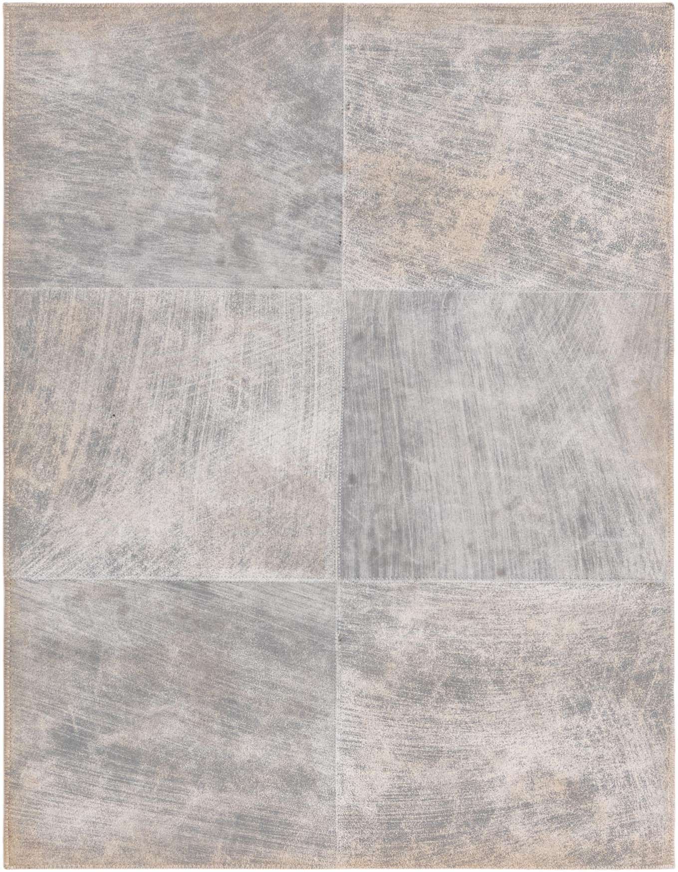 A 2x3 rectangular gray cowhide leather rug with a distressed, modern patchwork design, ideal for an entryway.