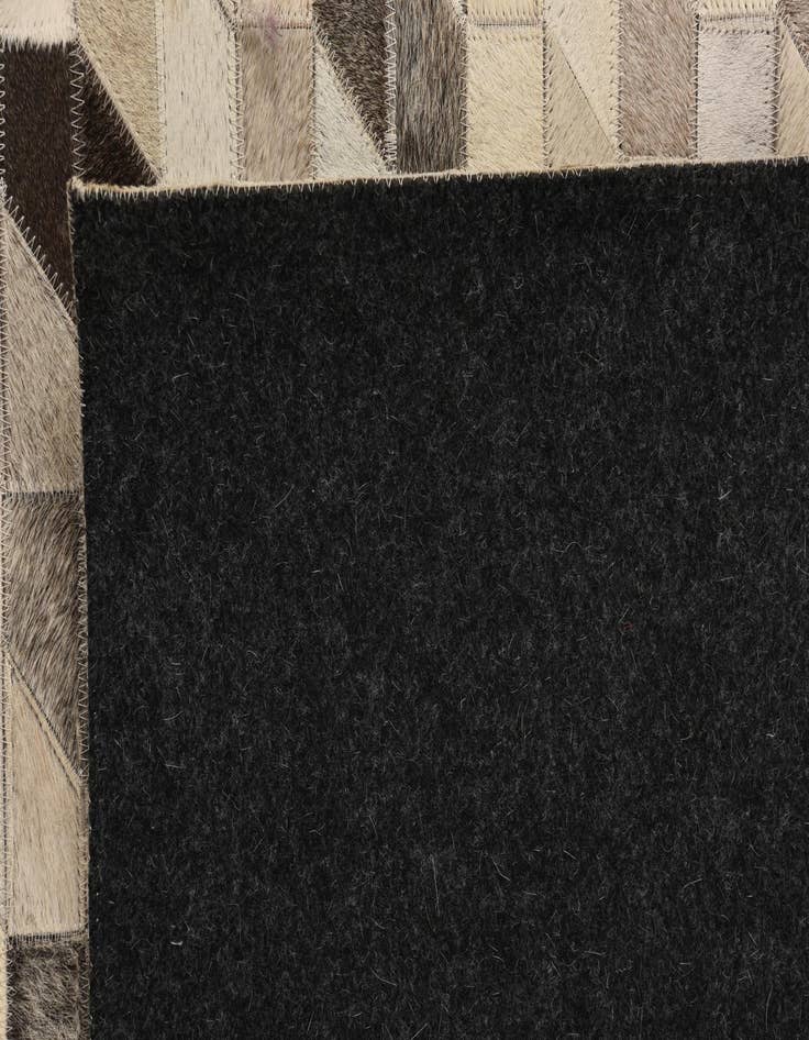 Detail image of  5' 2 x 7' 5 Cowhide Rug