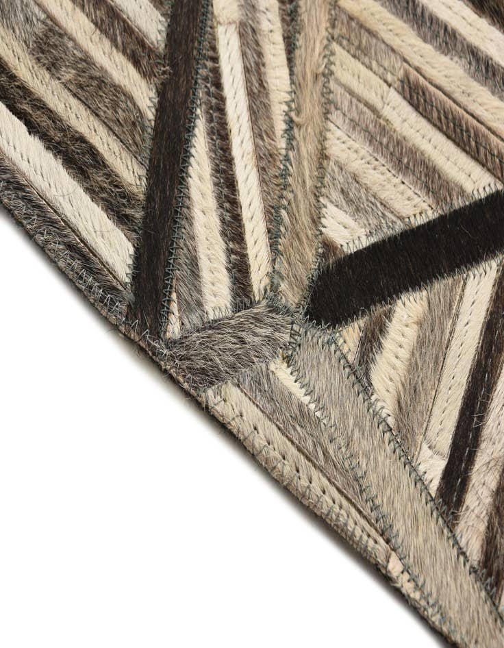 Detail image of  5' 2 x 7' 8 Cowhide Rug