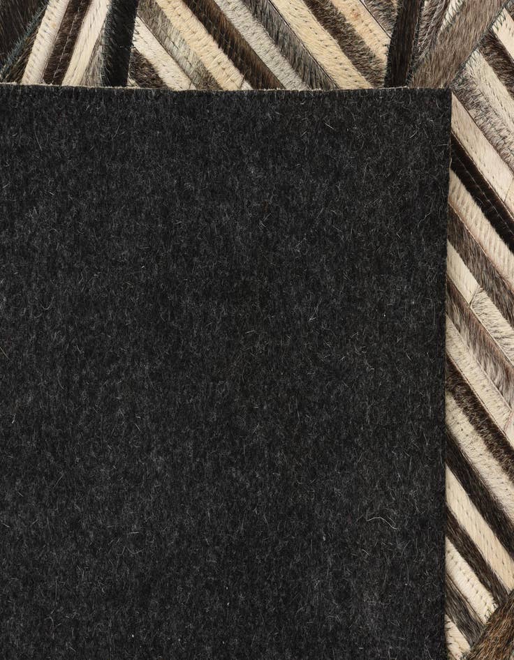 Detail image of  5' 2 x 7' 8 Cowhide Rug