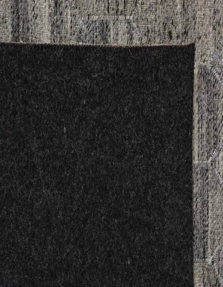 Detail image of  5' 1 x 8' 2 Cowhide Rug