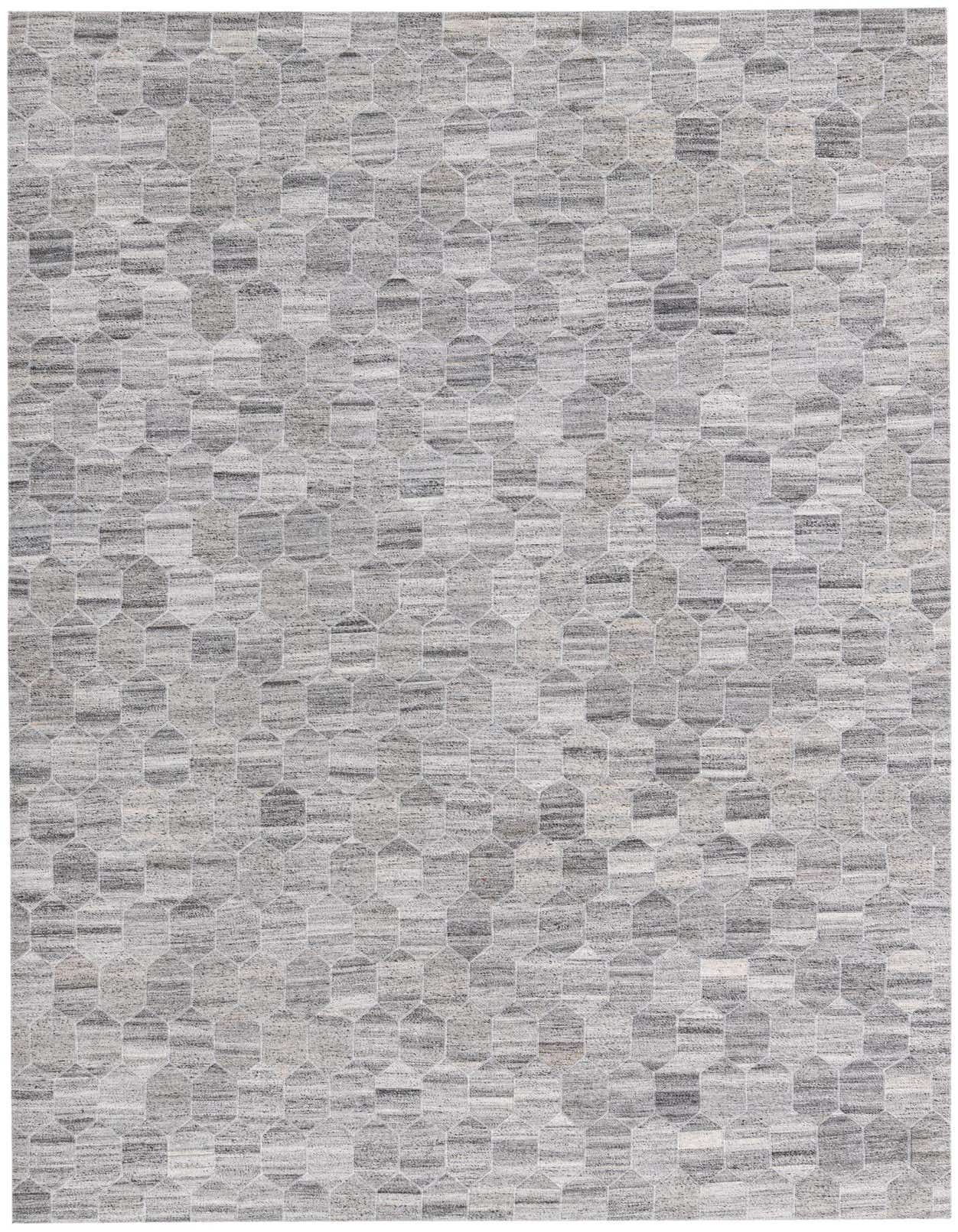 A 5x8 rectangular Cowhide & Leather rug in shades of gray and silver, featuring a modern geometric pattern of interlocking hexagons, suitable for a living room or office.