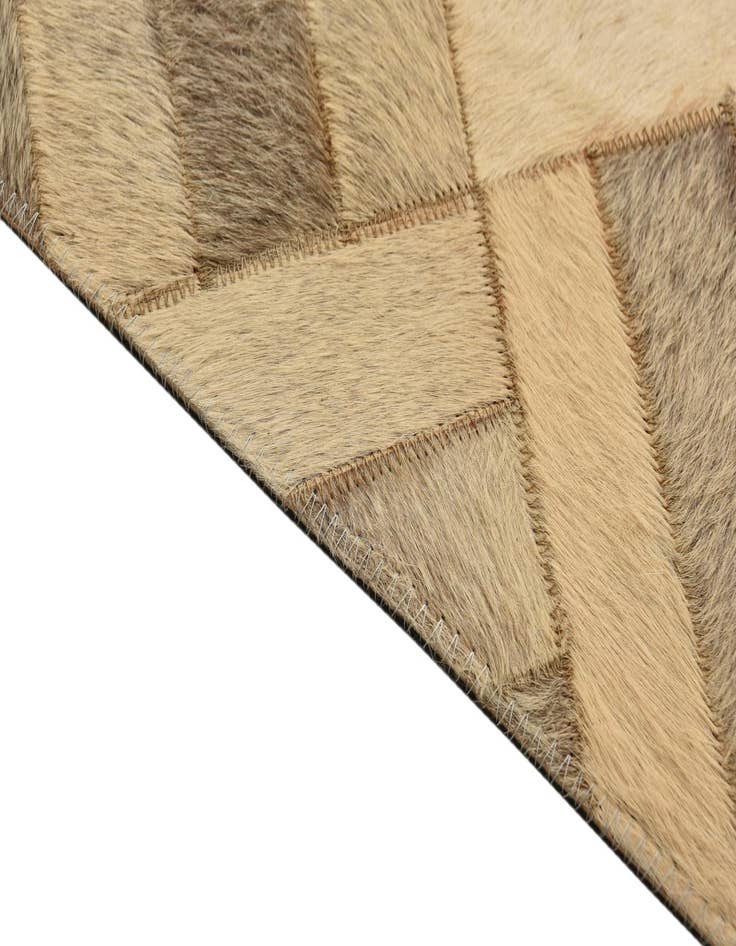 Detail image of  4' 10 x 7' Cowhide Rug