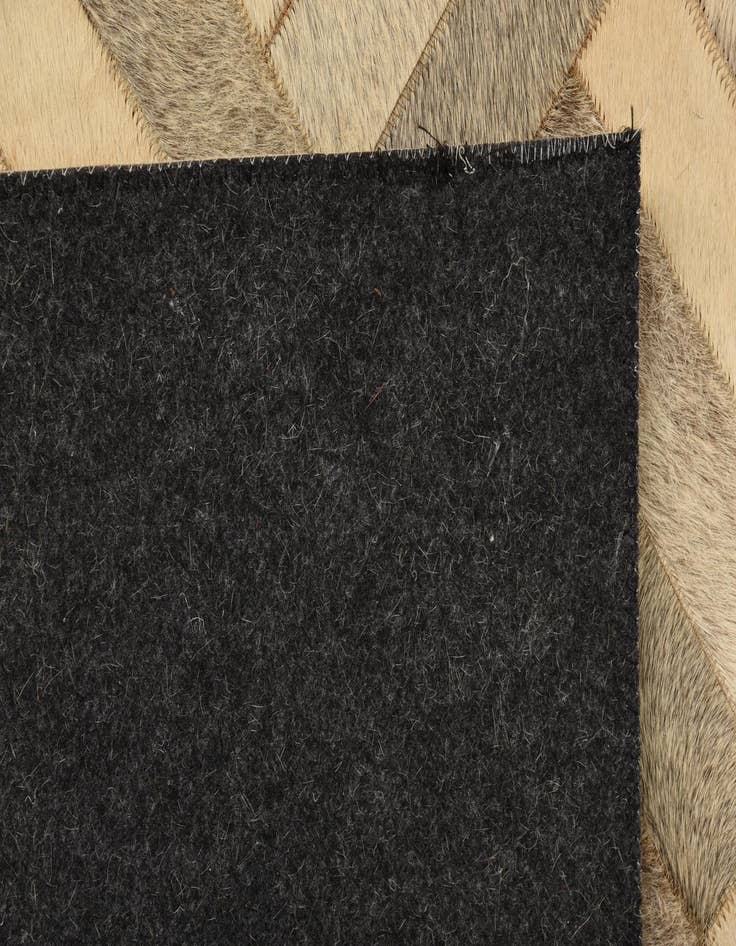 Detail image of  4' 10 x 7' Cowhide Rug