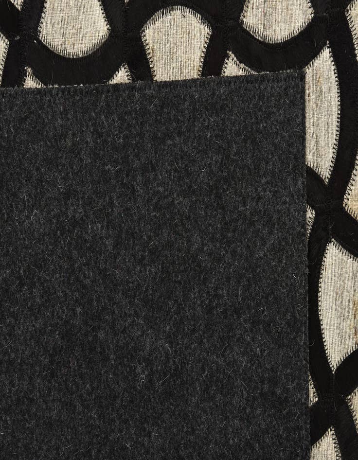Detail image of  5' x 7' 9 Cowhide Rug