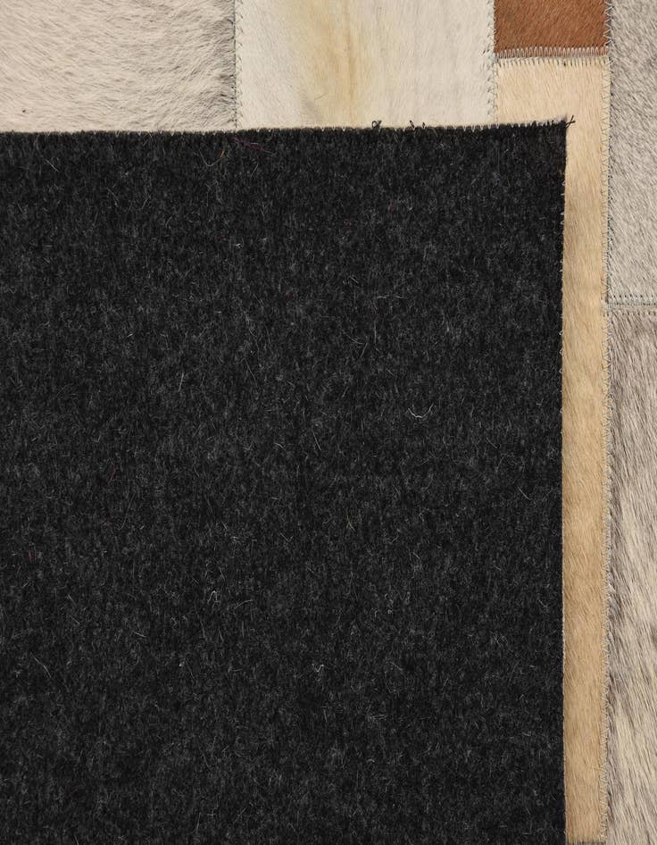 Detail image of  5' 1 x 8' 1 Cowhide Rug