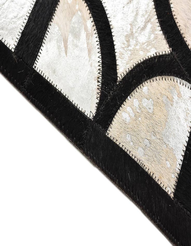 Detail image of  5' 2 x 7' 4 Cowhide Rug