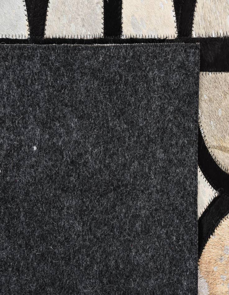 Detail image of  5' 2 x 7' 4 Cowhide Rug