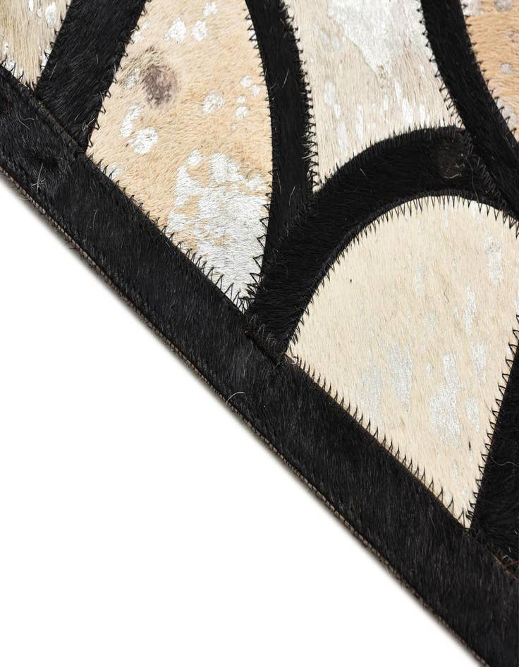 Detail image of  5' 3 x 7' 7 Cowhide Rug