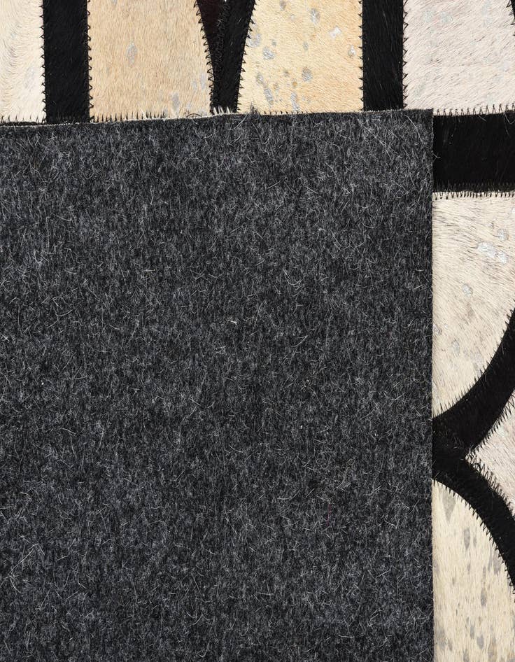 Detail image of  5' 3 x 7' 7 Cowhide Rug