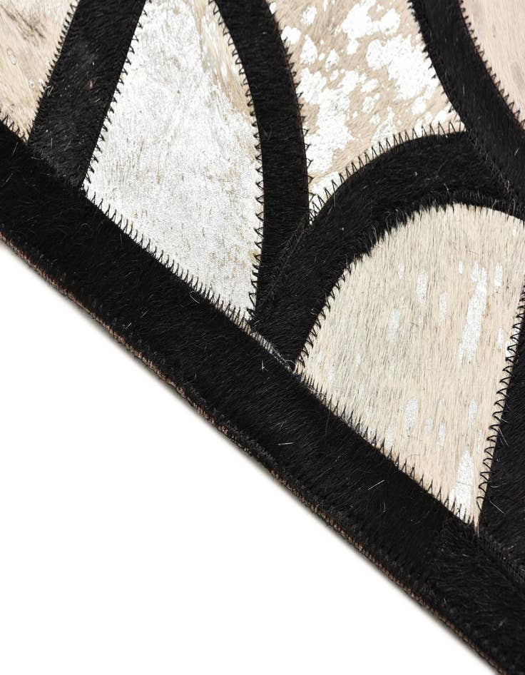 Detail image of  5' 3 x 7' 7 Cowhide Rug