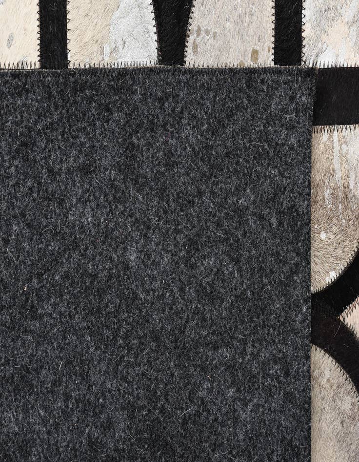 Detail image of  5' 3 x 7' 7 Cowhide Rug