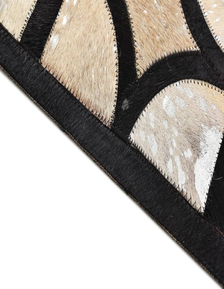 Detail image of  5' 3 x 7' 7 Cowhide Rug