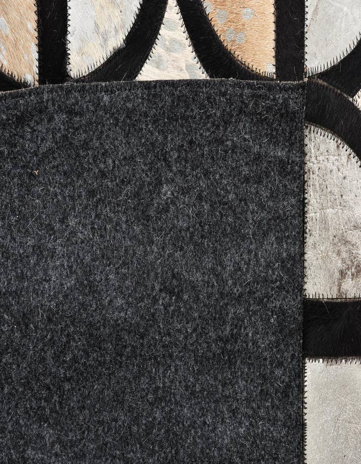Detail image of  5' 3 x 7' 7 Cowhide Rug