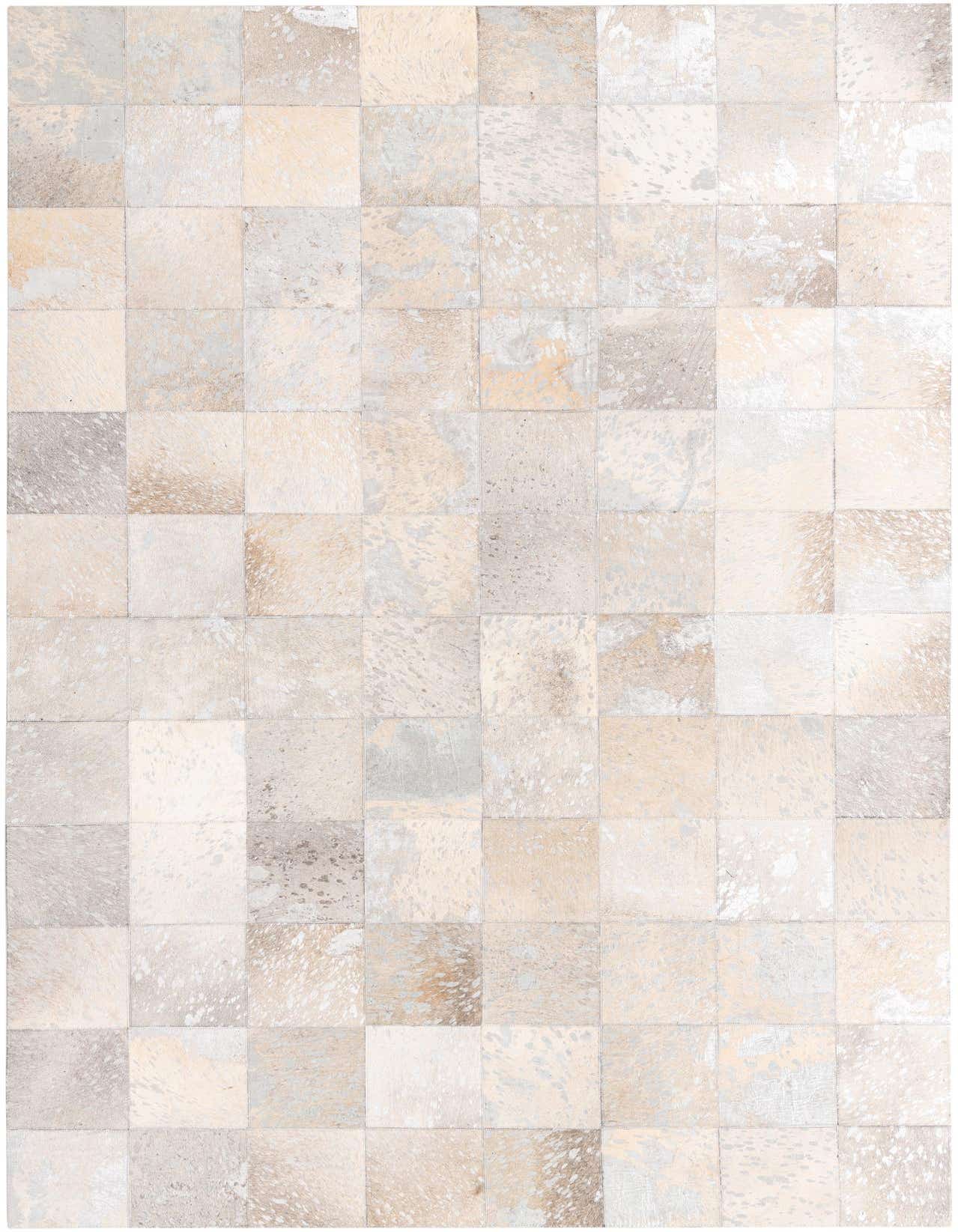 A 5x8 rectangular modern cowhide rug in varying shades of gray and silver, featuring a patchwork design.