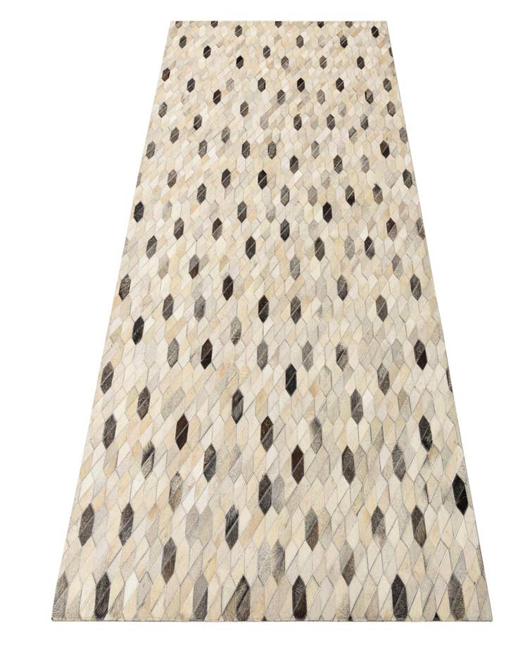 Detail image of  5' 2 x 7' 8 Cowhide Rug