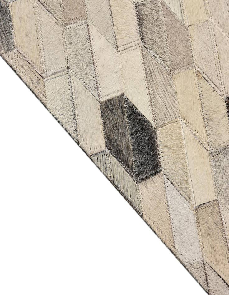 Detail image of  5' 2 x 7' 8 Cowhide Rug