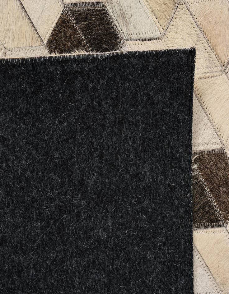 Detail image of  5' 2 x 7' 8 Cowhide Rug