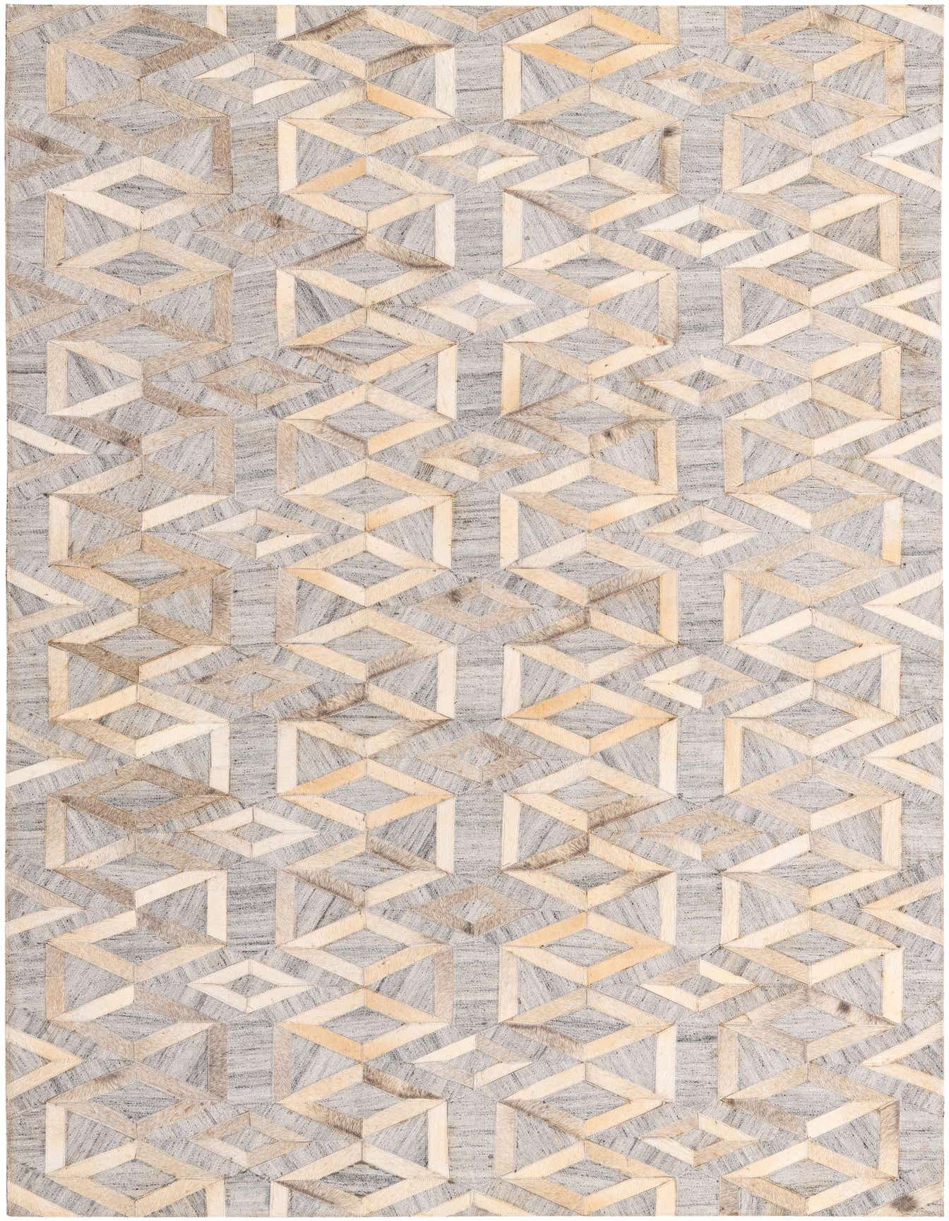 A 5x8 rectangular gray and silver cowhide rug with a modern geometric cube pattern, ideal for a living room.