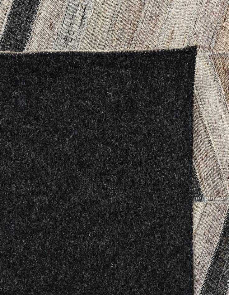 Detail image of  5' 4 x 8' 1 Cowhide Rug