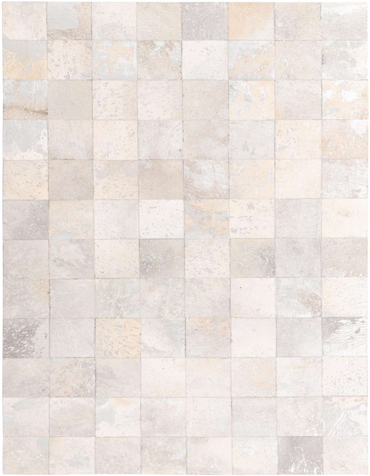 A 5x8 rectangular Cowhide rug featuring a modern patchwork design in varying shades of gray and silver.