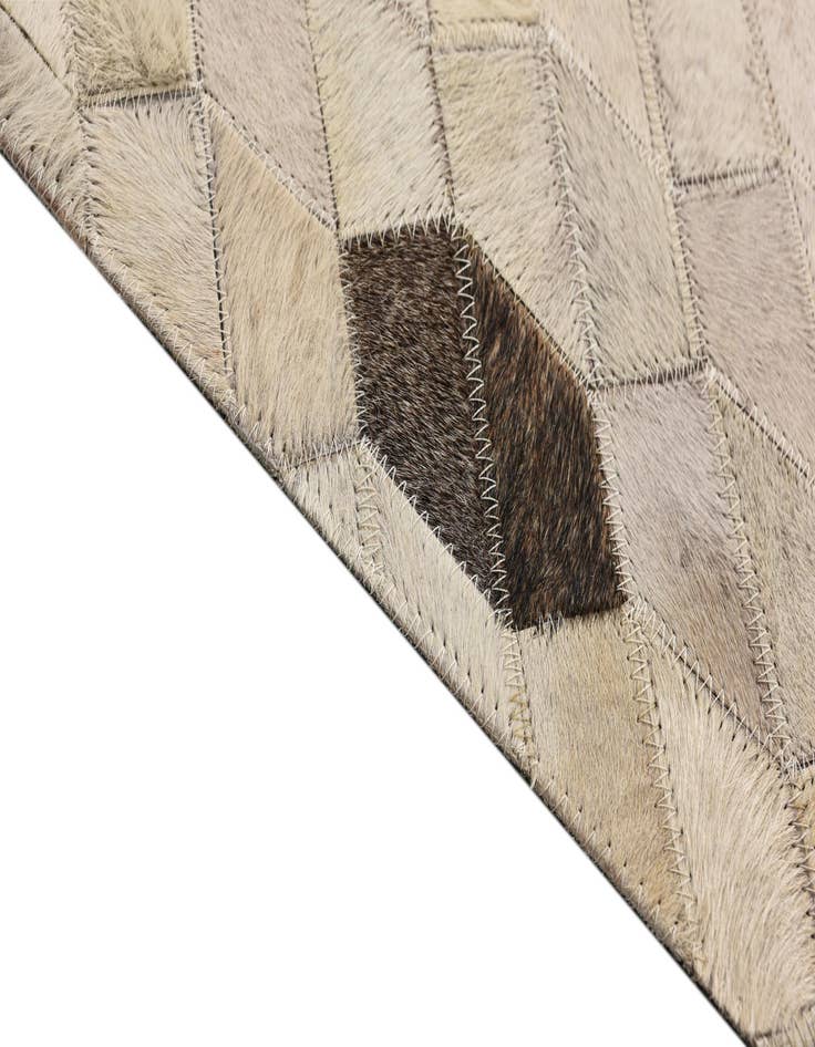 Detail image of  5' 4 x 7' 7 Cowhide Rug