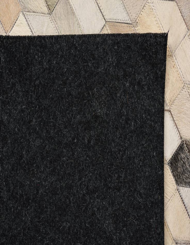 Detail image of  5' 4 x 7' 7 Cowhide Rug