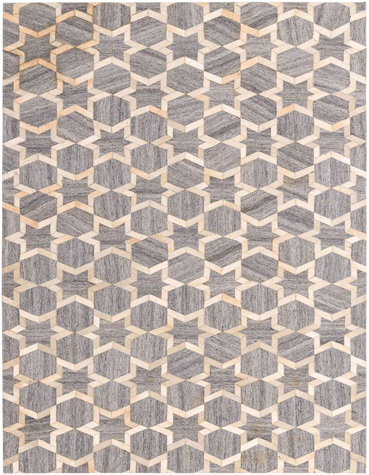 A 5x8 rectangular gray and silver modern cowhide rug with a geometric star and hexagon pattern.