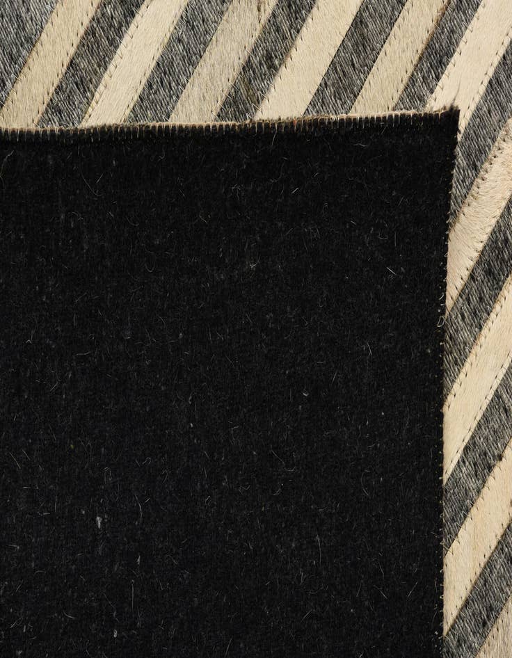 Detail image of  5' 1 x 8' 3 Cowhide Rug