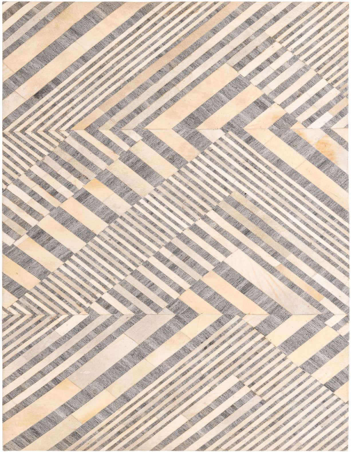 A 5x8 rectangular gray and cream modern cowhide rug with a striking geometric striped pattern, ideal for a living room.