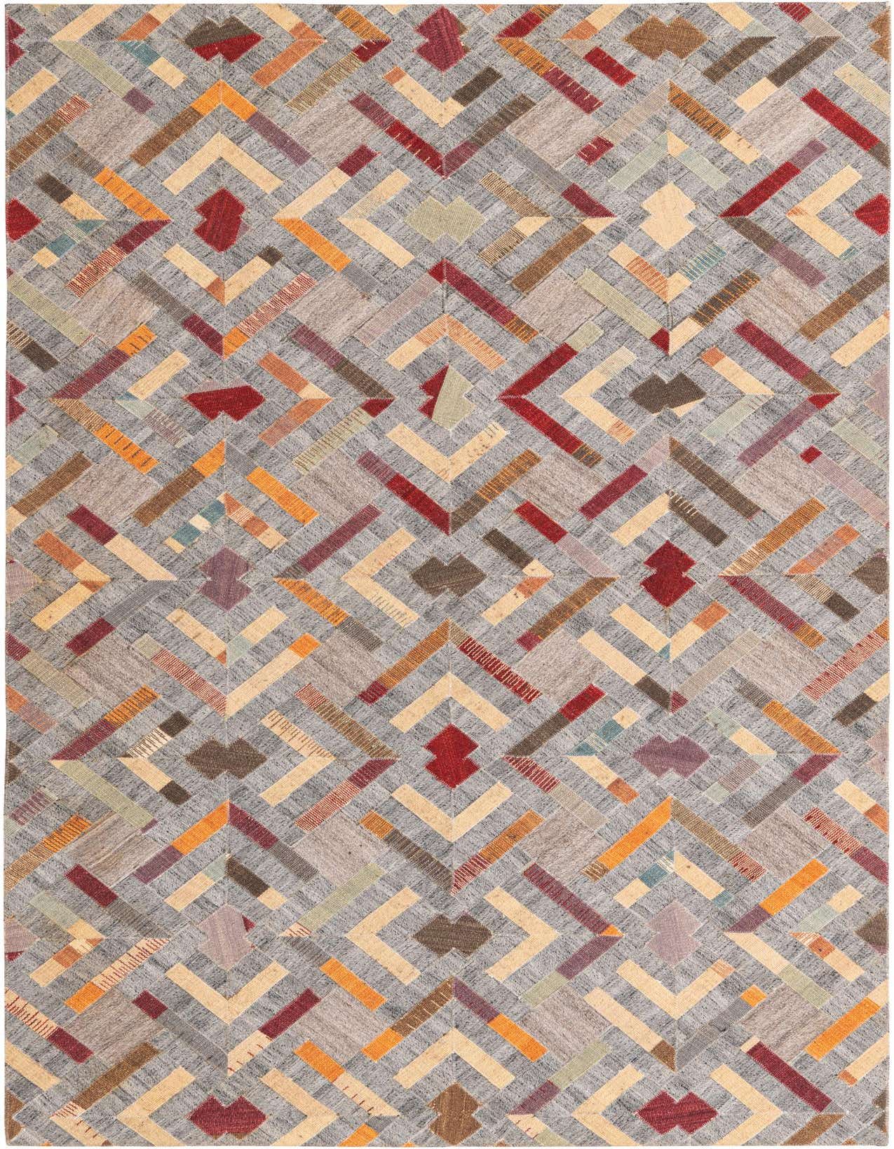 A 5x8 rectangular Cowhide rug featuring a modern geometric pattern in various shades of gray, silver, red, orange, and beige.