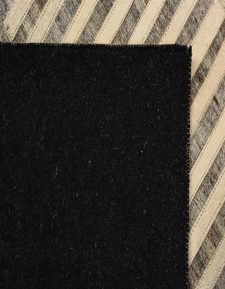 Detail image of  5' 1 x 8' 1 Cowhide Rug