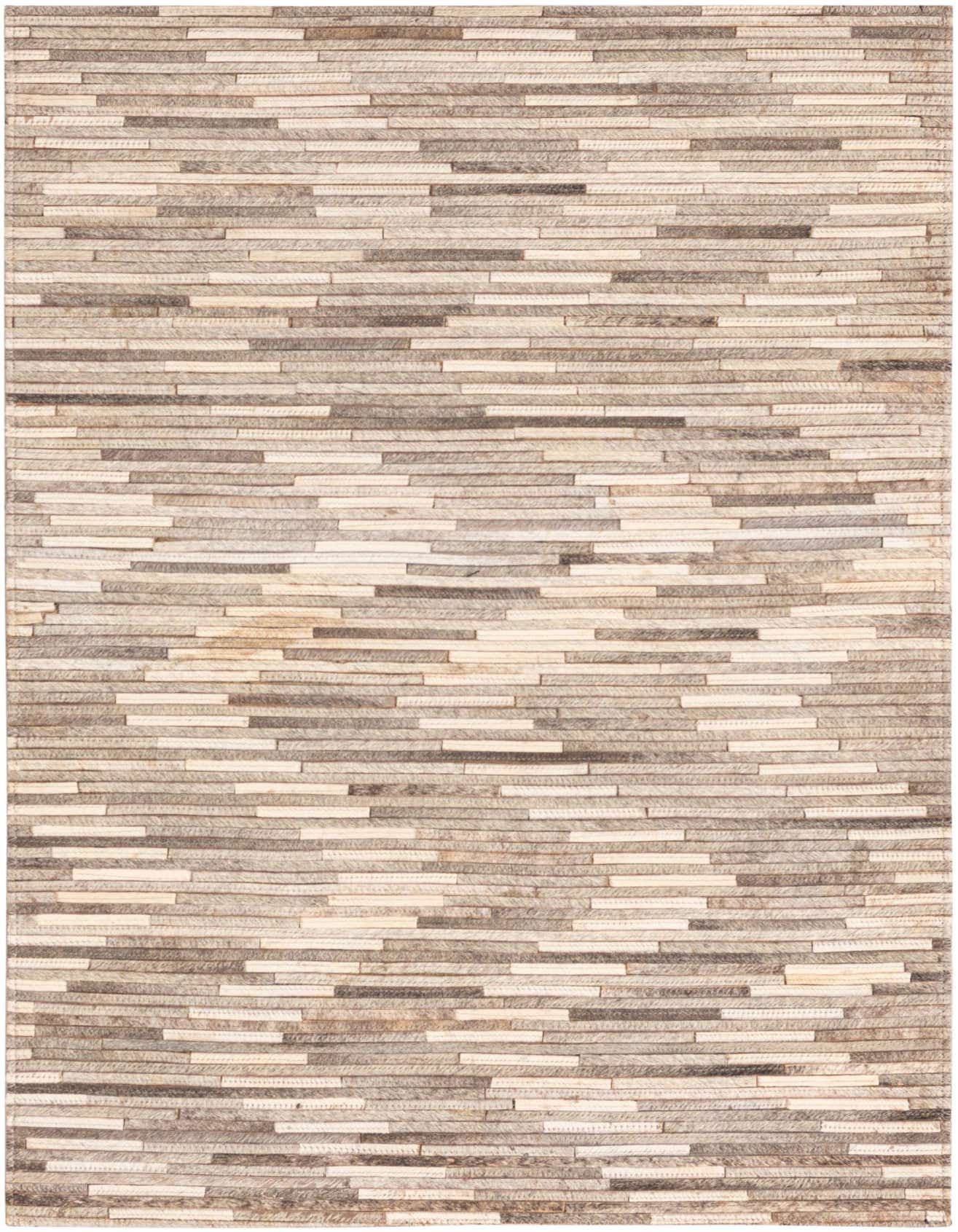 A 2x3 rectangular Cowhide rug featuring a modern stripe pattern in varying shades of gray and silver, suitable for an entryway.