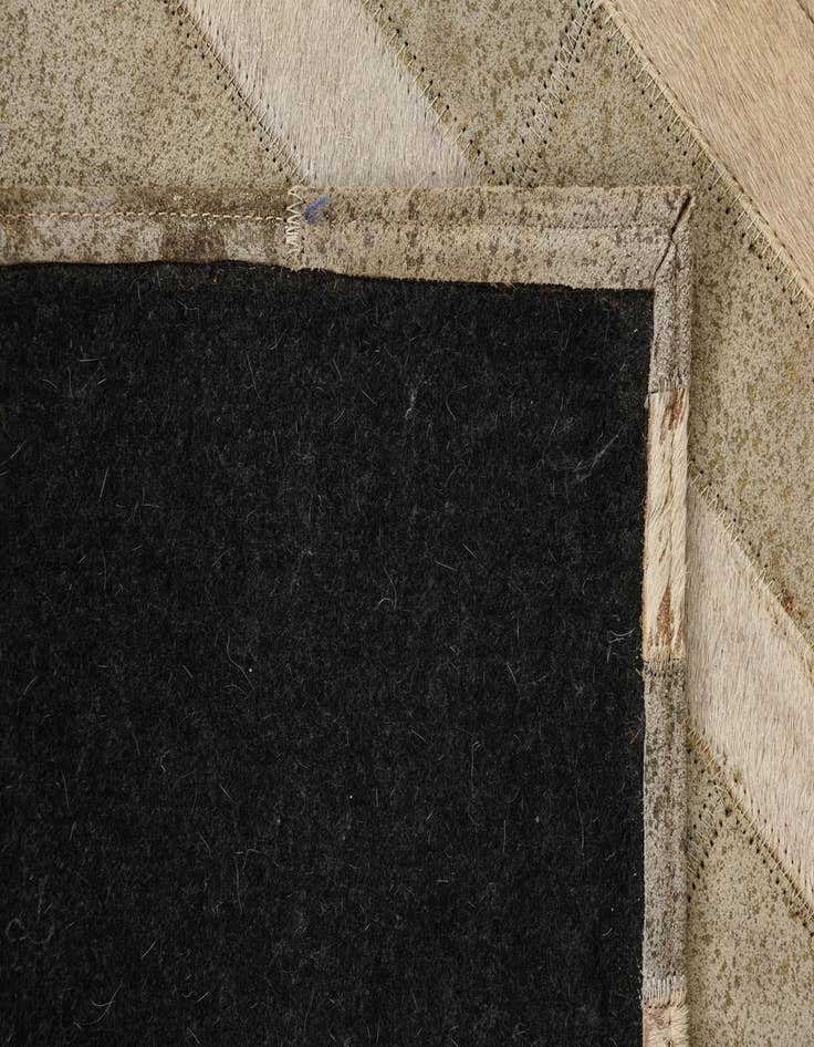 Detail image of  2' 1 x 3' Cowhide Rug