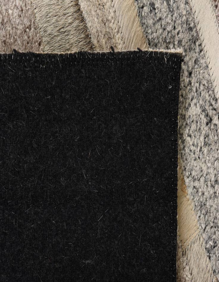 Detail image of  2' 1 x 3' Cowhide Rug