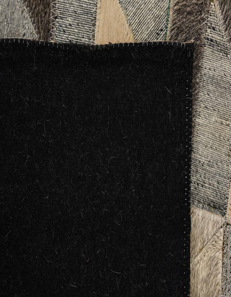 Detail image of  2' 1 x 3' Cowhide Rug