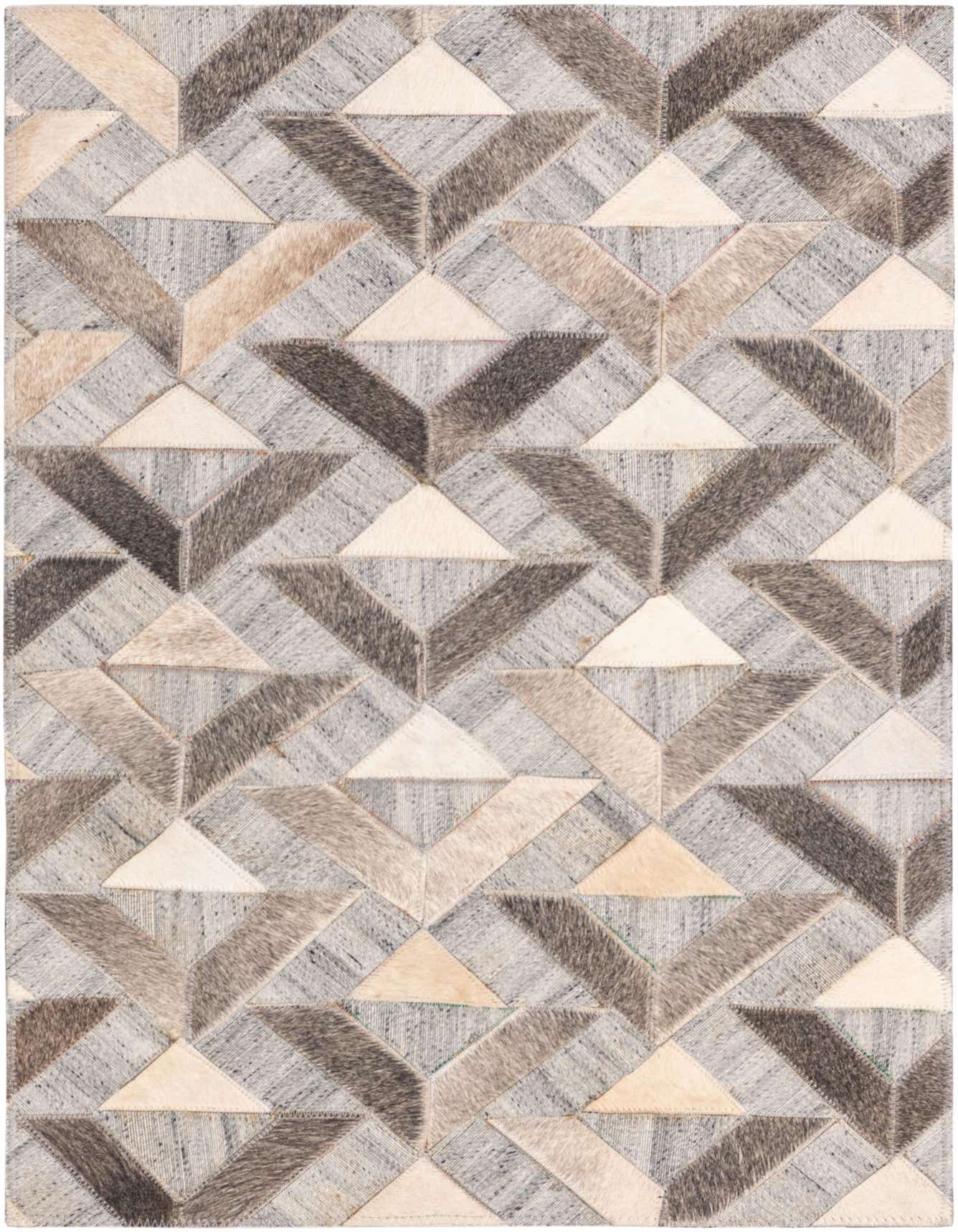 A 2x3 rectangular Rugs.com Cowhide rug featuring a modern geometric pattern in various shades of gray, silver, and cream.